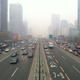 Illustration for article titled A UFO emerges from the smog over Beijing